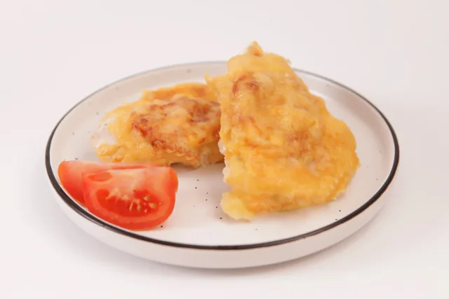 Грудка куриная под сыром с помидорами, кг
